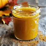 To make Sugar-Free Pumpkin Spice Syrup, you need simple ingredients. Here’s what you’ll need: - 2 cups water - 1 cup pure pumpkin puree - 1 tablespoon pumpkin pie spice - 1 teaspoon pure vanilla extract - ½ cup erythritol (or your choice of sugar substitute) - A pinch of sea salt These ingredients come together to create a rich, sweet syrup. The pumpkin puree gives a lovely texture and flavor. Erythritol adds sweetness without sugar. The pumpkin pie spice brings warmth and classic fall notes. Each ingredient in this syrup offers health benefits. Pumpkin puree is low in calories and high in fiber. It helps keep you full and supports digestion. Plus, it’s packed with vitamins A and C, which boost your immune system. Erythritol, the sweetener I recommend, has low calories and does not spike blood sugar. This makes it a great choice for people watching their sugar intake. Pumpkin pie spice can also help with digestion and has antioxidants that fight free radicals. If you want to try other sweeteners, there are great options. Stevia is a popular choice. It is very sweet, so you need less of it. Monk fruit sweetener is another good pick. It has zero calories and is safe for diabetics. These sweeteners can also provide health benefits. They are low in calories and do not raise blood sugar levels. You can choose any of these sweeteners based on your taste and health needs. To make this syrup, gather your ingredients. You will need: - 2 cups water - 1 cup pure pumpkin puree - 1 tablespoon pumpkin pie spice - 1 teaspoon pure vanilla extract - ½ cup erythritol (or your choice of sugar substitute) - A pinch of sea salt This simple list of items creates a great fall treat. You'll have a tasty syrup ready in only 15 minutes. 1. Start by pouring the water into a medium saucepan. 2. Add the pure pumpkin puree to the water. 3. Place the saucepan over medium heat. Stir gently until mixed well. 4. Once mixed, sprinkle in the erythritol. Keep stirring until it dissolves fully. 5. Now, add the pumpkin pie spice and a pinch of sea salt. 6. Let the mixture simmer for about 10 minutes. This step makes the flavors pop. 7. After 10 minutes, remove the saucepan from the heat. 8. Stir in the pure vanilla extract to mix in that lovely flavor. Let the syrup cool for a few minutes. Then, strain it through a fine mesh sieve or cheesecloth. This step is key to a smooth syrup. Discard any solids left behind. Make sure to use a clean glass jar or bottle for storage. Seal it up and keep it in the fridge. It stays fresh for two weeks. You can enjoy this syrup in many ways, like in coffee or on pancakes. Remember, this is just a quick guide to making the best syrup. For the full recipe, check out the complete instructions. Enjoy your fall treat! To get the best flavor from your syrup, use fresh pumpkin puree. Canned pumpkin can work, but fresh gives a brighter taste. Also, let the syrup simmer. This helps the spices blend. Stir often to keep it smooth. Taste as you go. Adjust sweetness to your liking. One mistake is not measuring the pumpkin pie spice. Too much can overpower the syrup. Another mistake? Skipping the salt. A small pinch brings out the flavors. Avoid cooking it too long. Overcooking can lead to a burnt taste. Lastly, don’t rush the cooling step. This helps the syrup thicken perfectly. This syrup works magic on pancakes and waffles. Drizzle it over oatmeal for a fall twist. You can also mix it into coffee or tea. It adds warmth and flavor to both. Try it in yogurt or smoothies for a tasty treat. You can even use it in baking for added flavor. For more ideas, check out the Full Recipe. {{image_4}} You can add fun flavors to your syrup. Try a dash of nutmeg for warmth. A little maple extract can bring a nice twist. If you like a kick, add a pinch of cayenne pepper. This adds spice that balances the sweet. Want a richer taste? Use brown sugar flavoring for depth. Each addition can create a unique syrup just for you! Erythritol works well, but other sweeteners can shine too. Stevia is a great choice for low-calorie lovers. Monk fruit sweetener gives a nice, sweet taste without the sugar. If you prefer honey, try a small amount. Just remember, honey is not sugar-free. Each sweetener can change the taste and texture, so experiment to find what you love best. This syrup can fit many diets. For keto, use erythritol or stevia. If you are vegan, the recipe is already plant-based. Just ensure your sweetener is vegan-friendly. Gluten-free? No worries; all the ingredients are safe. This syrup is versatile, so feel free to adapt it. You can enjoy the flavors without worry! To keep your sugar-free pumpkin spice syrup fresh, use a clean glass jar. Make sure the jar has a tight lid. Store the syrup in the refrigerator. This keeps the flavors bright and tasty. Avoid leaving it out at room temperature. Heat can spoil the syrup faster. Your syrup will last about two weeks in the fridge. After two weeks, check for any changes in smell or color. If it smells off, throw it away. If you want to enjoy it longer, try freezing it. You can freeze the syrup for up to six months. Pour the syrup into ice cube trays. Once frozen, pop the cubes into a freezer bag. This helps you use just what you need. When ready to use, thaw the cubes in the fridge overnight. This gives you a quick and tasty way to enjoy your syrup anytime! Yes, you can make this syrup vegan! The ingredients are already plant-based. Use water, pumpkin puree, and a sugar substitute like erythritol. You do not need any animal products. This makes it perfect for everyone. You can use the syrup in many ways. Drizzle it over pancakes or waffles for a tasty breakfast. Add it to coffee or tea for a warm drink. You can even use it in smoothies for extra flavor. It's a versatile treat to enjoy! You can find sugar-free pumpkin spice syrup at many grocery stores. Look in the baking aisle or near coffee products. If you prefer online shopping, check websites like Amazon or specialty food stores. Many brands offer their versions, so choose one that fits your taste. For the full recipe, check out the Pumpkin Spice Bliss Syrup section. You'll find easy steps to create this delightful syrup at home! This post covered how to make sugar-free pumpkin spice syrup. We explored key ingredients, their health benefits, and various sweeteners. I shared step-by-step cooking tips for great flavor and how to store it well. We also discussed variations to suit your taste and diet. In summary, making this syrup is easy and fun. You can enjoy it in many recipes. Now, get started on your own batch and savor the seasonal taste without the sugar!