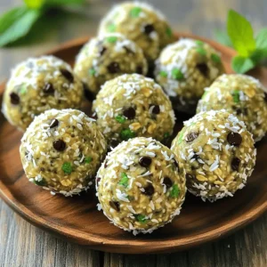 - 1 cup rolled oats - 1/2 cup almond butter - 1/3 cup honey or maple syrup - 1/4 cup chocolate protein powder - 1/4 cup mini dark chocolate chips - 1 teaspoon peppermint extract - 1/4 teaspoon sea salt - 2 tablespoons chia seeds (optional) - 1/4 cup shredded coconut (optional) I love using simple, wholesome ingredients for these protein balls. The rolled oats form the base, providing fiber and energy. Almond butter adds creaminess and healthy fats. You can choose honey or maple syrup for sweetness. Chocolate protein powder gives these balls a rich flavor while boosting protein. The mini dark chocolate chips add little bursts of joy in each bite. Peppermint extract brings that refreshing minty taste. The sea salt enhances all the flavors, making each bite pop. Chia seeds are optional but add extra texture and nutrients. Shredded coconut adds a fun twist, giving a tropical feel. Each ingredient plays a role in creating a delightful energy snack. Together, they make Mint Chocolate Chip Protein Balls a tasty and nutritious choice. - Mixing Dry Ingredients Start by taking a big mixing bowl. Add 1 cup of rolled oats, 1/4 cup of chocolate protein powder, and 1/4 teaspoon of sea salt. Use a spoon to mix these dry items well. This step is key for a balanced taste. - Preparing the Wet Ingredients In a second bowl, add 1/2 cup of almond butter, 1/3 cup of honey or maple syrup, and 1 teaspoon of peppermint extract. Whisk these together until smooth. This creamy mix will help bind everything. - Combining Mixtures Pour the wet mixture into the bowl with the dry ingredients. Stir it well until everything is blended. You want a uniform texture. If it feels too dry, add a splash more almond butter. - Adding Chocolate Chips and Optional Ingredients Next, fold in 1/4 cup of mini dark chocolate chips. You can also add 2 tablespoons of chia seeds if you want more crunch. Mix gently to keep the chips from breaking. - Rolling into Balls Grab a small amount of the mixture and roll it into a ball with your hands. Aim for the size of a tablespoon. Make sure they are all about the same size. This helps with even cooking and serving. - Chilling Instructions Place the rolled balls on a parchment-lined baking sheet. Make sure they have some space between them. Chill them in the fridge for about 30 minutes. This helps them firm up. After that, they are ready to enjoy! To get the perfect texture for your protein balls, start with the right amount of oats and almond butter. If your mixture is too sticky, add more oats or protein powder, one tablespoon at a time. If it feels dry, mix in a teaspoon of almond butter until it becomes easy to roll. To boost the flavor, consider adding a pinch more peppermint extract. You can also switch up the chocolate by using white chocolate chips or cocoa nibs. If you love coconut, adding extra shredded coconut can enhance the taste and texture. For an eye-catching display, arrange your protein balls on a pretty plate. Sprinkle some extra mini chocolate chips or shredded coconut on top. This not only makes them look great but adds a fun twist for your guests. {{image_4}} You can have fun with this recipe! Here are some easy ways to mix it up. - Different Nut Butters Try using peanut butter or cashew butter instead of almond butter. Each nut butter adds its own flavor and texture. If you want a nut-free option, sun butter works great too! - Substitute Sweeteners You can switch honey for agave syrup or use a sugar-free sweetener. Each option changes the taste and sweetness level. Just find what you like best! - Add-ins for Extra Flavor Want more crunch? Add chopped nuts or seeds. For a fruity twist, mix in dried fruit like cranberries or cherries. You can even stir in some cocoa powder for a richer chocolate taste! These variations let you create your perfect protein ball. Enjoy trying new things! How to Store in the Refrigerator Store your mint chocolate chip protein balls in an airtight container. This keeps them fresh and tasty. Place them in the fridge for up to a week. This way, they stay firm and delicious. Freezing for Long-Term Storage Want to save some for later? Freeze your protein balls! First, lay them on a baking sheet. Make sure they don’t touch each other. Freeze them for about two hours. Once they are solid, move them to a freezer-safe bag. They can last for up to three months in the freezer. Shelf Life and Freshness Tips These protein balls stay fresh for about a week in the fridge. If you notice any change in smell or texture, it’s best to toss them. For the best taste, eat them within the first few days. This way, you enjoy them at their peak flavor and texture. How can I customize the recipe? You can change the nut butter to peanut or cashew. Swap honey for agave syrup. Add nuts or seeds for crunch. Use different protein powders for variety. You can even change the flavor by using almond or vanilla extract instead of mint. Can I make these protein balls vegan? Yes, you can make them vegan. Use maple syrup instead of honey. Choose a plant-based protein powder. Almond butter is already vegan. Just ensure all ingredients are plant-based. Where can I buy pre-made mint chocolate chip protein balls? You can find them at health food stores. Many grocery stores carry them too. Online shops like Amazon also sell various brands. Check the labels for ingredients and nutrition info. What are the nutritional benefits of these protein balls? These protein balls provide protein from almond butter and chocolate powder. They have fiber from oats and chia seeds. Healthy fats from almond butter support energy. The dark chocolate chips add antioxidants. How long do homemade protein balls last? Homemade protein balls last about one week in the fridge. Store them in an airtight container. For longer storage, freeze them for up to three months. Just thaw before eating! In this post, I shared how to make tasty mint chocolate chip protein balls. We covered the key ingredients, easy steps, and helpful tips. You learned about fun variations and how to store them well. These protein balls are great for snacks or quick energy. They fit any diet and are easy to make. I encourage you to try them for a healthy treat. Enjoy your mint chocolate chip protein balls!
