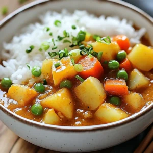 - 1 cup Japanese short-grain rice - 1 tablespoon vegetable oil - 1 onion, finely chopped - 2 garlic cloves, minced - 1-inch piece of fresh ginger, grated - 2 carrots, peeled and sliced into rounds - 2 medium potatoes, diced - 1 cup chicken or vegetable broth - 1 medium apple, finely grated - 3 tablespoons Japanese curry powder (or curry roux) - 1 cup frozen peas - Salt and pepper to taste - Fresh green onions, chopped (for garnish) When making cozy Japanese curry rice, you need quality ingredients. Start with Japanese short-grain rice. This rice gives a sticky and soft texture. It&rsquo;s the perfect base for the curry. Next, gather your vegetables. You will need an onion, carrots, potatoes, and peas. These add color and flavor. The onion brings a sweet taste, while carrots and potatoes add heartiness. Don&rsquo;t forget the peas! They add a nice pop of color and sweetness. Aromatics are key. Use minced garlic and grated ginger. They add depth and warmth. Garlic gives a sharp bite, while ginger provides a fresh zing. For the curry's heart, use chicken or vegetable broth. This adds a rich flavor. The Japanese curry powder or roux is what gives the dish its unique taste. It&rsquo;s a blend of spices that makes the curry both savory and sweet. Lastly, the grated apple is a secret weapon. It adds sweetness and balances the spices. Don&rsquo;t skip it! These ingredients combine to create a warm and tasty meal. Each bite of curry over rice feels like a cozy hug. Enjoy the process of gathering these items and preparing your dish! {{ingredient_image_2}} 1. First, rinse 1 cup of Japanese short-grain rice under cold water. Keep rinsing until the water runs clear. This step removes extra starch and helps the rice cook better. 2. Drain the rice well. Let it sit for a few minutes to dry slightly. 3. In a medium saucepan, add the rinsed rice and 1 &frac14; cups of fresh water. Bring it to a rolling boil. 4. Once boiling, lower the heat to low. Cover the saucepan and let it simmer for 15-20 minutes. The rice should absorb all the water. 5. After cooking, turn off the heat and let it sit, covered, for another 10 minutes. This helps the rice steam and become fluffy. 1. While the rice cooks, heat 1 tablespoon of vegetable oil in a large pot over medium heat. 2. Add 1 finely chopped onion. Saut&eacute; it for about 5 minutes until it becomes soft and translucent. 3. Next, add 2 minced garlic cloves and 1 inch of grated ginger. Stir for about a minute until they smell great. 4. Now, toss in 2 sliced carrots and 2 diced medium potatoes. Stir well to coat them with the oil and onion. 5. Pour in 1 cup of chicken or vegetable broth. Bring the mixture to a gentle boil. 6. Once boiling, reduce the heat to low. Let it simmer for about 15 minutes. The vegetables should be tender and easy to pierce with a fork. 1. After the veggies are soft, mix in 3 tablespoons of Japanese curry powder and the grated apple. 2. Stir until the sauce thickens, which should take about 5-10 minutes. If it&rsquo;s too thick, you can add more broth or water. 3. Add 1 cup of frozen peas to the pot. Stir well and cook for another 2-3 minutes until the peas are warmed through. 4. Taste the curry and adjust the seasoning with salt and pepper as needed. Now, you are ready to serve! - Troubleshooting common issues: If your curry is too thick, add more broth or water. If it&rsquo;s too thin, let it simmer longer without the lid. For burnt flavors, scrape the bottom gently, but be careful not to stir in any burnt bits. - How to enhance flavor: Use fresh spices for the best taste. Adding a bit of soy sauce or mirin can deepen the flavor. The grated apple adds sweetness, but feel free to adjust based on your taste. - Presentation ideas for an Instagram-worthy bowl: Use a large, shallow bowl to show off the rice and curry. Garnish with bright green onions for color. Place a small dish of pickled vegetables on the side for contrast and extra flavor. - Suggested accompaniments: Serve with a side of steamed broccoli or a cucumber salad. These add freshness and crunch to your meal. - Recommended pots and utensils for best results: A medium saucepan works well for the rice. Use a large pot with a thick bottom for the curry to prevent burning. A wooden spoon is perfect for stirring. Having a microplane for grating the ginger and apple makes the prep easier. Pro Tips Rinse Your Rice: Make sure to rinse the rice thoroughly until the water runs clear. This removes excess starch and helps achieve a fluffy texture. Vegetable Variations: Feel free to mix in other vegetables like bell peppers or green beans for added nutrition and color. Adjusting Spice Level: If you prefer a milder curry, start with less curry powder and gradually add more to suit your taste. Make It Ahead: This curry can be made in advance and stored in the refrigerator for up to 3 days. Simply reheat before serving. {{image_4}} You can easily adapt this cozy Japanese curry rice bowl for different diets. If you want a vegetarian or vegan version, swap chicken broth for vegetable broth. Use tofu or chickpeas instead of meat for protein. You can also add more veggies like bell peppers or spinach. For gluten-free options, look for gluten-free curry powder or roux. Many brands offer blends that keep the flavor without gluten. Just check the labels to make sure they fit your diet. Feel free to play with the vegetables in this dish. You can use zucchini, sweet potatoes, or even broccoli. Each swap brings its own taste and texture. For protein, try using shrimp or beef instead of chicken. If you want to enhance the flavor, add coconut milk for creaminess or a dash of chili powder for heat. These simple changes can make your dish unique and exciting. You can give your curry a local twist by incorporating regional ingredients. For instance, adding corn or black beans can give it a new flair. You might also try using spices from your area to mix with the curry flavor. Fusion recipes are another fun way to explore. How about adding some Italian herbs for an unexpected kick? Or try serving it with naan instead of rice for a fun twist! These ideas keep your cozy curry fresh and interesting. To store your cozy Japanese curry rice bowl, let it cool first. Place the leftovers in an airtight container. This keeps the dish fresh and tasty. You can store it in the fridge for up to three days. After that, the flavors may fade. If you want to keep it longer, freezing is a great option. Here&rsquo;s how to do it: 1. Allow your curry to cool completely. 2. Spoon the curry into freezer-safe containers. 3. Leave some space at the top for expansion as it freezes. 4. Seal tightly and label with the date. When you&rsquo;re ready to eat, thaw the curry in the fridge overnight. Reheat it on the stove or in the microwave. Add a splash of broth or water to keep it moist. This will help the texture stay just right. Preparing this cozy dish in advance saves time. You can chop the veggies ahead of time. Store them in the fridge in separate containers. When you&rsquo;re ready to cook, just saut&eacute; and simmer. You can also cook a big batch of rice. Cool it and store it in the fridge. When it&rsquo;s time to eat, warm it up and serve with your curry. This way, you can enjoy a warm meal on busy nights! What is Japanese curry made of? Japanese curry is a mix of spices, broth, and vegetables. Key ingredients include onions, carrots, potatoes, and protein. You often find it thickened with curry powder or roux. The flavor is sweet and savory, thanks to the grated apple. Can I use different types of rice? You can use other rice types, but Japanese short-grain rice is best. It is sticky and absorbs flavors well. If you prefer basmati or jasmine rice, they work too, but the texture will change. How long does it take to make curry rice? Making curry rice takes about 50 minutes in total. You spend around 15 minutes on prep and 35 minutes for cooking. This includes time for rice and curry to be ready. Can I scale the recipe for more servings? Yes, you can easily scale the recipe. Just double or triple the ingredients. Adjust the broth and spices to taste. Keep in mind that cooking time may change slightly. What can I use instead of Japanese curry powder? If you don't have Japanese curry powder, use curry paste or powder from other regions. Indian curry powder can work, but it has a different flavor. Adjust the amount based on your taste. Alternatives for apples in the recipe? You can use pear or even a bit of honey for sweetness. Both will add a nice touch. If you prefer no fruit, just skip it altogether. The curry will still taste great! This blog post outlined how to make delicious Japanese curry rice from scratch. We covered essential ingredients, step-by-step cooking instructions, and helpful tips. Don't forget variations for dietary needs and ways to serve your dish. Remember to store leftovers properly for future meals. Using the right ingredients and methods will help you create a tasty meal every time. Enjoy your cooking journey and share your curry creations with others!