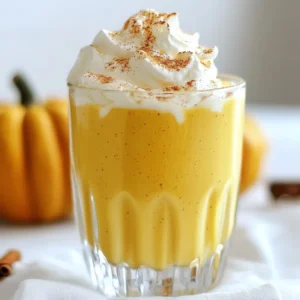 To make Pumpkin Spice Eggnog, gather these key ingredients: - 2 cups whole milk - 1 cup heavy cream - 3/4 cup pumpkin puree (fresh or canned) - 1/2 cup granulated sugar - 4 large egg yolks - 1 teaspoon vanilla extract - 1 teaspoon ground cinnamon - 1/2 teaspoon ground nutmeg - 1/4 teaspoon ground ginger - Pinch of salt - Whipped cream (for topping) - Ground cinnamon or nutmeg (for garnish) If you want to change things up, here are some swaps: - Use almond milk or oat milk for a dairy-free option. - Swap granulated sugar with maple syrup or honey for a natural sweetener. - Try using pumpkin spice mix instead of individual spices for ease. - You can replace heavy cream with coconut cream for a vegan version. Garnishing adds flair to your eggnog. Here are some fun ideas: - Top with a generous dollop of whipped cream for richness. - Sprinkle ground cinnamon or nutmeg on top for extra flavor. - Add a cinnamon stick for a festive touch and a hint of spice. - For a unique twist, consider adding a drizzle of caramel sauce. {{ingredient_image_2}} Start by warming the base. In a medium saucepan, mix together 2 cups of whole milk, 1 cup of heavy cream, and 3/4 cup of pumpkin puree. Heat this on medium-low. Stir gently until it feels warm, but do not let it boil. This takes about 5 minutes. Keep a close eye on the pot. While the milk mixture warms, grab a mixing bowl. Add 4 large egg yolks and 1/2 cup of granulated sugar. Use a whisk to blend these. You want the mix to turn light yellow and thicken up a bit. This should only take about 2-3 minutes. Now, it&rsquo;s time to temper the eggs. Slowly pour the warm milk mix into the egg yolk mix. Do this in a thin stream while whisking. This step is key to keep the eggs from scrambling. After mixing, pour everything back into the saucepan. Cook on low heat while stirring for 5-7 minutes. You want it thick enough to coat the back of a spoon, but do not let it boil. Once thickened, take the pan off the heat. Stir in 1 teaspoon of vanilla extract, 1 teaspoon of ground cinnamon, 1/2 teaspoon of ground nutmeg, and 1/4 teaspoon of ground ginger. Also, add a pinch of salt. Mix until every spice is well blended in the eggnog. Let the eggnog cool at room temperature for about 30 minutes. After that, put it in the fridge for at least 2 hours to chill completely. When ready to serve, pour the cold eggnog into glasses. Top each glass with whipped cream. Finally, sprinkle a little ground cinnamon or nutmeg for extra flavor and a pretty look. To keep your eggnog smooth, warm the milk and pumpkin mix slowly. When you add the warm mixture to the egg yolks, pour it in a thin stream. Whisk non-stop as you pour. This helps the eggs warm up without cooking. If you pour too fast or stop whisking, you might end up with scrambled eggs. After you make your eggnog, let it cool at room temperature for about 30 minutes. Then, put it in the fridge for at least 2 hours. This helps the flavors blend well. If you want it super cold, chill longer. Just remember to cover it well so it doesn&rsquo;t pick up any fridge smells. You can change the sweetness and spice to fit your taste. To make it less sweet, cut back on the sugar. For a spicier kick, add more cinnamon or nutmeg. Start with small amounts, then taste as you go. This way, you get the perfect flavor just for you. Pro Tips Choose Quality Milk: Using high-quality whole milk and heavy cream will result in a richer and creamier eggnog. Fresh Spices Matter: For the best flavor, use freshly grated nutmeg and ground spices instead of pre-ground versions. Make Ahead: This eggnog can be made a day in advance. Allow it to chill overnight for the flavors to meld beautifully. Serve Cold: Always serve the eggnog chilled. It enhances the flavors and provides a refreshing drink during the autumn season. {{image_4}} You can make the pumpkin spice eggnog even more fun by adding alcohol. A splash of bourbon or rum gives it a warm kick. Choose your favorite spirit and mix it in just before serving. This drink is great for holiday parties. Just remember to drink responsibly! If you want a vegan version of this drink, swap out the dairy. Use almond milk or coconut milk instead of whole milk and heavy cream. For the egg yolks, you can use silken tofu blended until smooth. This version tastes just as rich and creamy, making it perfect for everyone. Combine your eggnog with coffee for a cozy treat. Brew a strong cup of coffee or espresso. Then, mix in your chilled pumpkin spice eggnog. Top it with whipped cream and a sprinkle of cinnamon. This latte brings warmth and joy, making it perfect for chilly days! After you enjoy your pumpkin spice eggnog, you may have some left. Store it in an airtight container. This keeps it fresh and safe. Place it in the fridge right away. It stays good for about 3 to 5 days. Make sure to stir it before serving again. The spices may settle, and you want that rich flavor! You can freeze pumpkin spice eggnog for later. Pour the leftover eggnog into freezer-safe containers. Leave some space at the top. This allows for expansion. It can last up to 3 months in the freezer. When you are ready to enjoy it again, thaw it in the fridge overnight. Stir well before serving. To reheat your pumpkin spice eggnog, pour it into a saucepan. Heat it slowly on low. Stir often to prevent burning. You want it warm, not hot. If it gets too hot, it can curdle. If you prefer, you can also microwave it in short bursts. Just remember to stir between intervals. Enjoy it warm with your favorite toppings! Yes, you can use less sugar. Start with half the amount. Taste it, and add more if needed. This way, you control the sweetness while keeping the rich flavor. Homemade eggnog lasts about 3 to 5 days in the fridge. Be sure to store it in a sealed container. If it smells or looks off, do not drink it. Serve it chilled in a festive glass. Add a generous dollop of whipped cream on top. Finish with a sprinkle of cinnamon or nutmeg for a lovely touch. Yes, you can make eggnog without eggs. Use a mixture of coconut cream and almond milk instead. Blend in spices and sweeteners for flavor. You can find ready-made pumpkin spice eggnog in most grocery stores. Look in the dairy section, especially during fall. Brands like Organic Valley and Silk often carry it. You learned about the key ingredients for pumpkin spice eggnog, including substitutions. The step-by-step guide helps you make a smooth, creamy drink. Tips show how to avoid common mistakes and adjust flavors. We explored fun variations, from spiked versions to vegan options. You also found info on storage and answered common questions. Now, you can enjoy making this festive drink at home, impressing friends and family. Embrace your creativity, and have fun with the flavors!