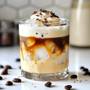 To make a Bold Espresso White Russian, you need a few key ingredients: - 1 cup strong brewed espresso, cooled - 1 cup milk (or your preferred dairy alternative) - 2 tablespoons coffee-flavored syrup (or chocolate syrup for a twist) - 1 tablespoon vanilla extract - Ice cubes - Coffee beans or chocolate shavings for garnish These ingredients create a creamy, rich drink with a bold coffee flavor. The espresso gives a strong kick, while the milk adds smoothness. You can customize your Bold Espresso White Russian by adding optional ingredients. Some ideas include: - Flavored syrups like hazelnut or caramel - A splash of coffee liqueur for extra depth - A pinch of cinnamon for warmth These additions can change the drink's taste, making it fun and personal. If you prefer non-dairy options, there are many great choices for milk. Here are a few: - Almond milk - Oat milk - Coconut milk Each alternative brings a unique flavor and texture. For example, oat milk is creamy and complements the espresso well. Test different options to find your favorite! {{ingredient_image_2}} Start with strong coffee beans. Grind them to a fine powder. Use about two tablespoons of coffee for each shot. Boil water to 200&deg;F (just off boil). Pour the hot water over the coffee grounds. If you have an espresso machine, this is easy. Just follow the machine's steps. If not, a French press works too. Let it steep for about 30 seconds. Press down slowly. You want a rich, bold flavor. Cool the brewed espresso to room temperature or chill it in the fridge to speed things up. Grab a mixing jug and combine your cooled espresso. Add one cup of milk or your favorite dairy alternative. Next, pour in two tablespoons of coffee-flavored syrup. If you want something different, chocolate syrup is a fun choice. Add one tablespoon of vanilla extract for extra flavor. Stir the mix well until it&rsquo;s smooth. Make sure the syrup dissolves completely. This step ensures every sip is delicious. Take two glasses and fill them with ice cubes. Pack the ice tightly to keep the drink cold. Pour the espresso mix over the ice slowly. This creates a beautiful layered look. You can see the colors blend as you pour. After filling, gently stir to mix the layers. For a special touch, top each drink with coffee beans or chocolate shavings. This makes your drink look fancy and adds a nice taste. Enjoy your Bold Espresso White Russian! To brew strong espresso at home, use fresh coffee beans. Grind them finely for the best flavor. Use about 2 tablespoons of coffee for each shot of espresso. Heat water to about 200&deg;F (93&deg;C) and brew for 25-30 seconds. This will create a rich and bold espresso that enhances your cocktail. If you want extra strength, try double shots. For the best flavor, mix the espresso with milk and a coffee-flavored syrup. You can add chocolate syrup for a sweet twist. Vanilla extract adds depth and sweetness, making your drink even better. Experiment with different milk types, like almond or oat, for unique tastes. The key is balance; make sure no flavor overpowers the others. Don't skip cooling the espresso. Warm espresso can melt the ice too fast and dilute your drink. Avoid using low-quality coffee beans; they can make your cocktail taste bitter. Also, don&rsquo;t rush the mixing. Whisking well helps all flavors blend fully. Lastly, remember to garnish! Coffee beans or chocolate shavings not only look nice but also add extra flavor. Pro Tips Chill Your Ingredients: For an extra refreshing drink, chill your milk and espresso before mixing. This will keep your drink colder for longer. Experiment with Syrups: Try different flavored syrups beyond coffee or chocolate, such as hazelnut or caramel, to add a unique twist to your drink. Layering for Presentation: Pour the espresso mixture slowly over the ice to create a beautiful layered effect. This adds visual appeal to your drink. Garnishing Options: Get creative with your garnishes! Consider adding whipped cream, a sprinkle of cinnamon, or even a chocolate drizzle for an indulgent touch. {{image_4}} To make an Iced Bold Espresso White Russian, start with the same ingredients. Brew your espresso strong, then cool it down. Instead of serving it warm, pour the cooled espresso over ice. This gives you a refreshing drink perfect for hot days. The ice will keep your drink chilled as you sip. You can still add milk and coffee syrup, just like the classic version. It&rsquo;s a great way to enjoy this drink in a new way. You can play with flavors to make your Bold Espresso White Russian unique. Chocolate syrup adds a sweet twist if you want a dessert-like drink. Hazelnut syrup gives a nutty flavor that pairs well with coffee. You can also try vanilla bean paste for a richer taste. Mix and match these flavors to suit your mood. Each choice adds a delicious layer of taste to your cocktail, making it special. If you want a drink without alcohol, you can easily make an alcohol-free version. Just skip the coffee-flavored liqueur. Use the same strong brewed espresso, milk, and syrup. This way, you still get the rich flavors without any alcohol. It&rsquo;s perfect for gatherings when you want everyone to enjoy a tasty drink. You can garnish it the same way, keeping it fancy and fun! To keep your leftover ingredients fresh, store them in airtight containers. Place any unused espresso in the fridge. Milk or dairy alternatives should also go in the fridge. Coffee-flavored syrup can stay in a cool, dark place. If you use chocolate syrup, store it the same way. If you have leftover Bold Espresso White Russian, refrigerate it right away. Use a sealed container to prevent spills. Try to drink it within 24 hours for the best taste. If you see separation, just stir it before enjoying. Avoid freezing the cocktail; the texture may change. You can prepare the espresso and mix it with the syrup and vanilla ahead of time. Just keep it in the fridge until you are ready to serve. When you are ready, pour over ice and add milk. This method saves time and keeps the flavors fresh. Yes, you can use instant coffee. Just mix it with hot water to dissolve. This method is easy and quick. However, brewed espresso gives a richer taste. Instant coffee might lack the bold flavor you want. If you choose instant, go for a strong blend to get the best flavor. To make a vegan Bold Espresso White Russian, swap the milk for a plant-based option. Almond, oat, or soy milk work well. Ensure your coffee-flavored syrup is vegan too. Many brands offer vegan options. Check the label to be sure. This way, you can enjoy the drink without dairy. The best milk for this recipe depends on your taste. Whole milk gives a creamy texture. If you want a lighter option, choose almond or oat milk. Coconut milk adds a fun twist with its unique flavor. Use any milk you love for the perfect drink. In this post, you learned how to craft a Bold Espresso White Russian. We covered key ingredients, from essential to optional flavors. I provided tips for brewing perfect espresso and mixing your drink for the best taste. You can try variations like iced or alcohol-free versions, too. Finally, we explored storage tips and answered common questions. Remember, perfecting this cocktail takes practice, but it&rsquo;s worth it. Enjoy your homemade drink, and impress your friends!